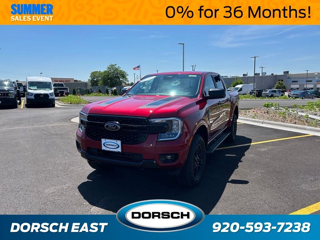 2026 Ford Ranger XLT in Ruby Red Metallic Tinted Clearcoat — front three-quarter view