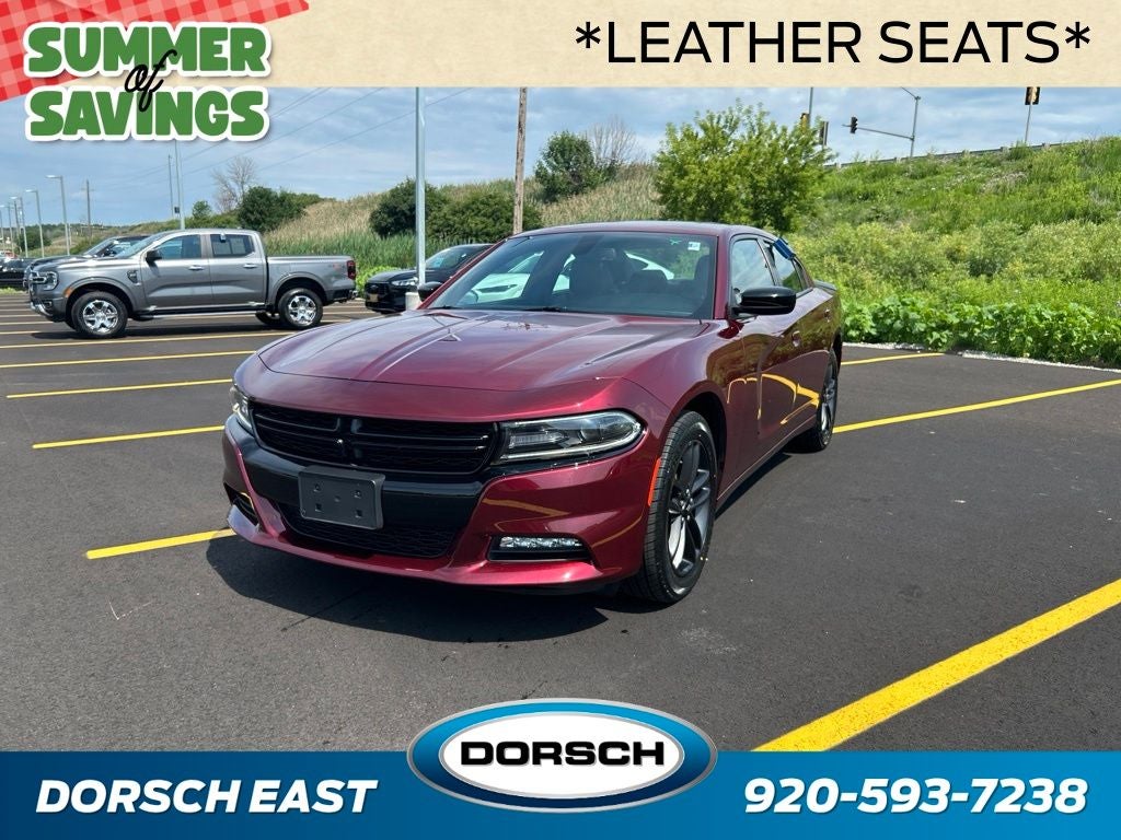 2019 Dodge Charger SXT in Octane Red Pearlcoat — front three-quarter view