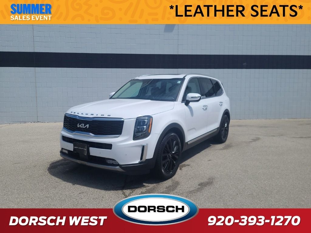 2022 Kia Telluride SX Prestige in Glacial White Pearl — front three-quarter view