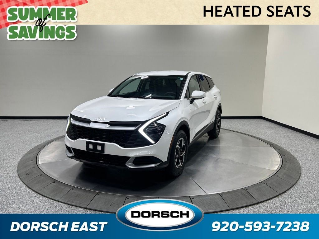 2024 Kia Sportage LX in Snow White Pearl — front three-quarter view